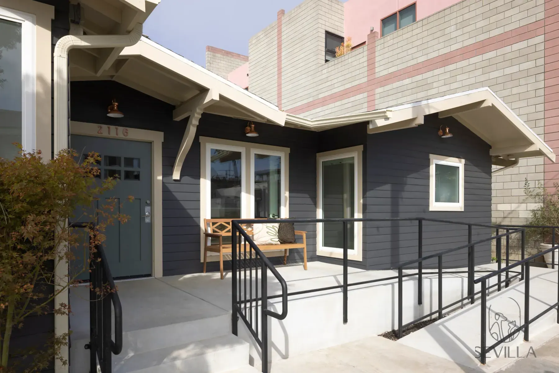 Exterior arrival view of Sevilla Veterinary Hospital with accessibility ramp